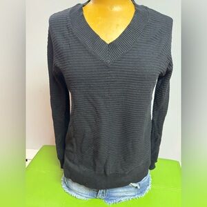 Women's Black V‑Neck Ribbed Knit Sweater . 50% viscose . Excellent condition